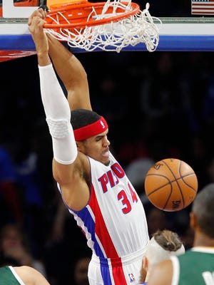 Detroit Pistons forward Tobias Harris dunks during the first half of the team's NBA basketball game against the Utah Jazz, Wednesday, March 15, 2017, in Auburn Hills, Mich. (AP Photo/Carlos Osorio)