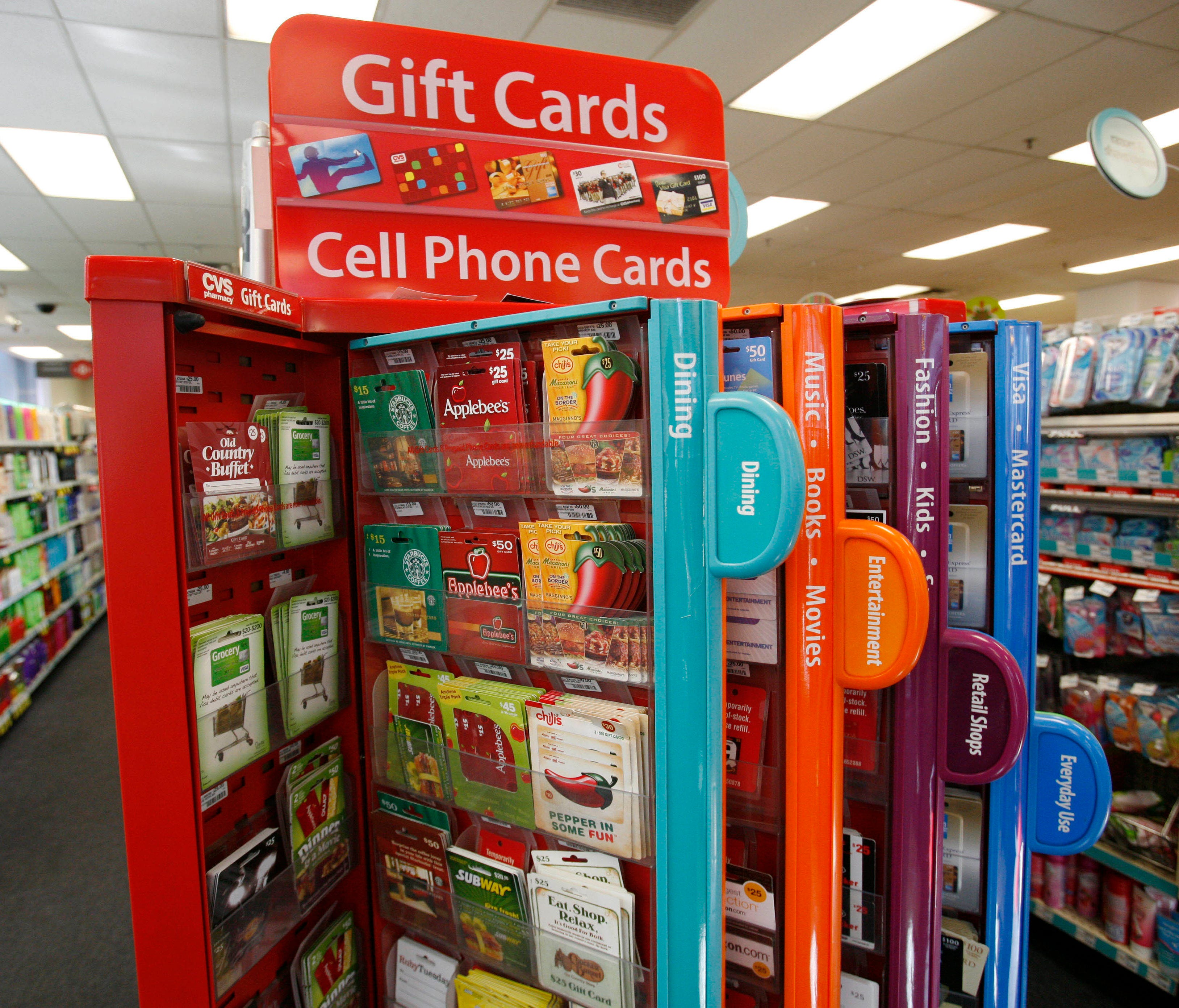 A gift card kiosk is shown at a CVS/Pharmacy in New York. Gift cards are a popular present at the holidays. The National Retail Federation says more than half of consumers plan to give one in 2016. But they aren't always wanted, as research organizat