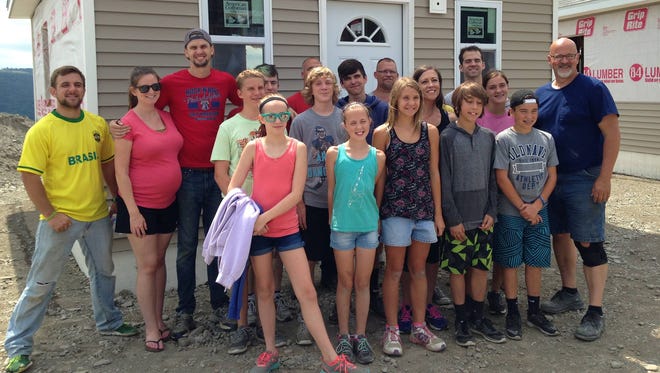 New Jersey churches sent youth groups to work on Second Wind Cottages in Newfield.