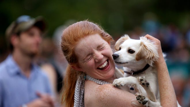 Amy hafer dances with her dog Luneta at the Bohemian Nights New West Fest Friday, August 15, 2014.