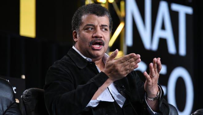 Neil deGrasse Tyson speaks on stage at the National Geographic Channel 2015 Winter TCA  in Pasadena, Calif.