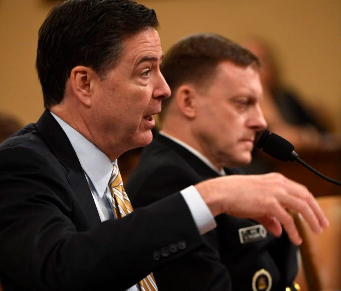 FBI Director James Comey, left, and National Security Agency Director Mike Rogers on March 20, 2017.