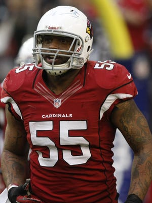 This Dec. 8, 2013 file photo shows Arizona Cardinals outside linebacker John Abraham (55) during the first half of an NFL football game against the St. Louis Rams in Glendale, Ariz.