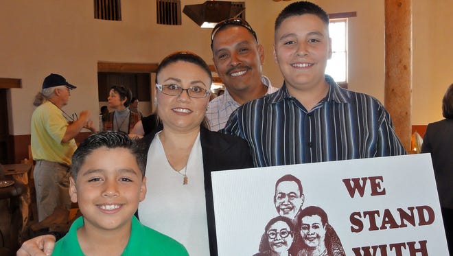 Rosa Robles Loreto with her sons, Jose Emiliano (left) and Gerardo (far right), and her husband Gerardo Grijalva.