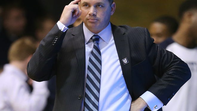 Butler Bulldogs head coach Chris Holtmann signals to his players to play a little smarter in the second half of their game. Georgetown defeated Butler 60-54.
Mar 3, 2015; Indianapolis, IN, USA; [CAPTION] at Hinkle Fieldhouse. Mandatory Credit: Matt Kryger-USA TODAY Sports