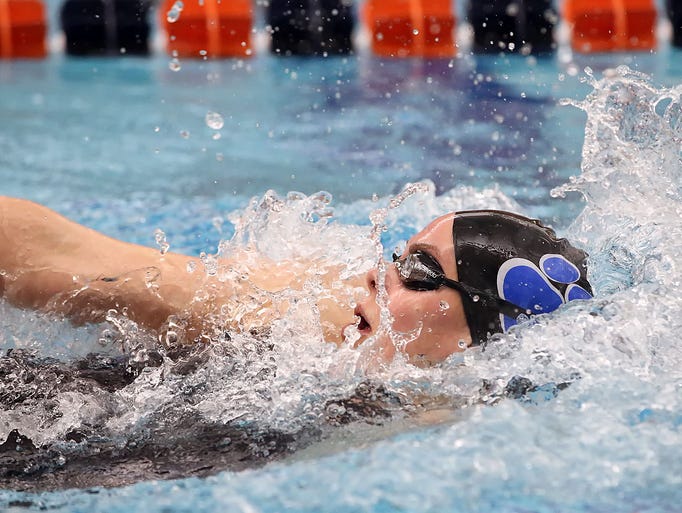 Dallastown's Kacey Oberlander, swims the backstroke