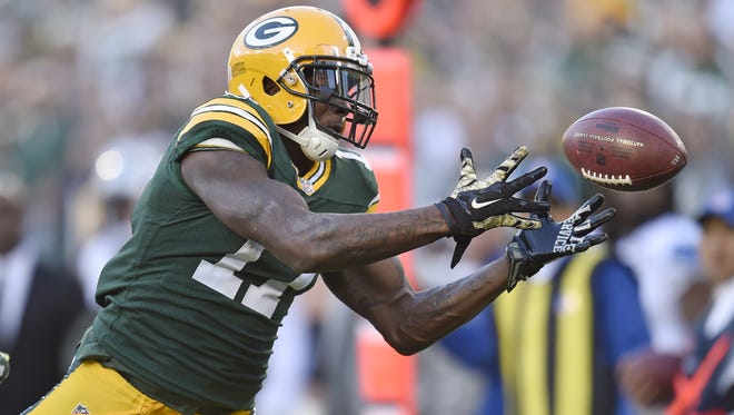 Green Bay Packers wide receiver Davante Adams (17) can't secure a fourth quarter pass against the Detroit Lions at Lambeau Field.