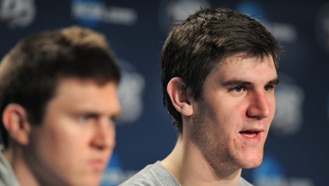 FILE – Butler's Andrew Smith answer questions from the media during a press conference at the NCAA tournament in 2013.