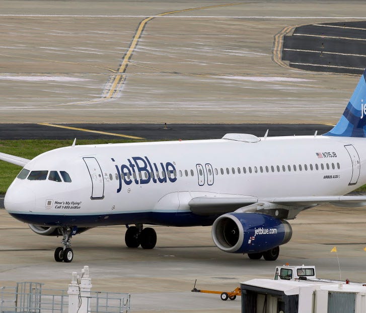 A JetBlue Airways Airbus A320-232 pushes back from the gate at the Tampa International Airport in Tampa, Fla., on May 15, 2014.
