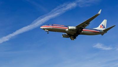 An American Airlines jet prepares to land at Ronald Reagan National Airport in February 2014