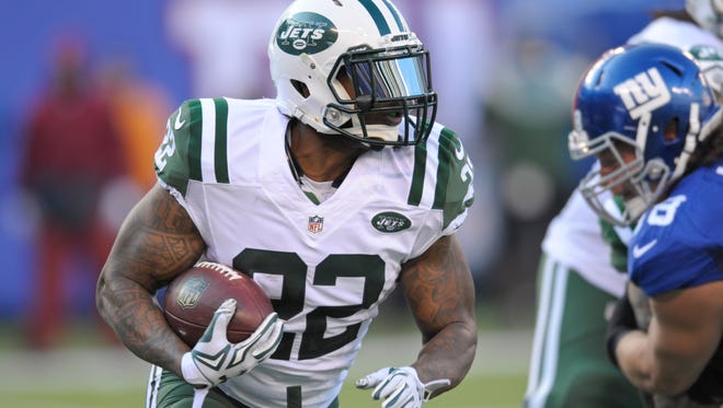 New York Jets running back Stevan Ridley rushes against the New York Giants on Dec. 6, 2015, in East Rutherford, N.J.