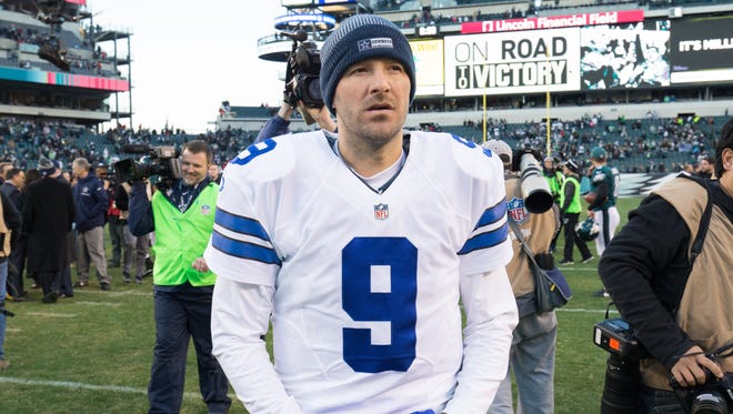 Dallas quarterback Tony Romo walks off the field in Philadelphia after the Cowboys' Week 17 loss. Columnist Mark Knudson predicts Romo to be traded to Denver next season.
