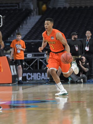 Trae Bell-Haynes dribbles up the court during the Reese's NABC all-star men's basketball game at the Alamodome on Friday night.
