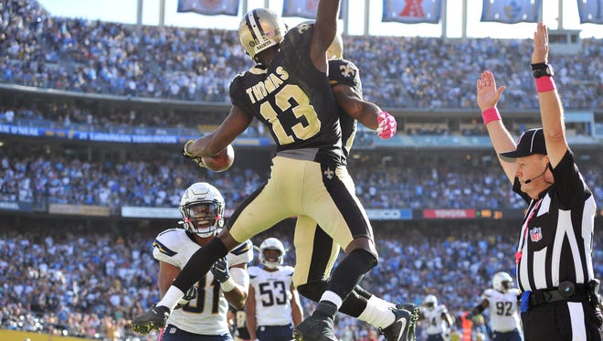 Oct 2, 2016; San Diego, CA, USA; New Orleans Saints wide receiver Michael Thomas (13) celebrates after a touchdown during the second half of the game against the San Diego Chargers at Qualcomm Stadium. New Orleans won 35-34. Mandatory Credit: Orlando Ramirez-USA TODAY Sports
