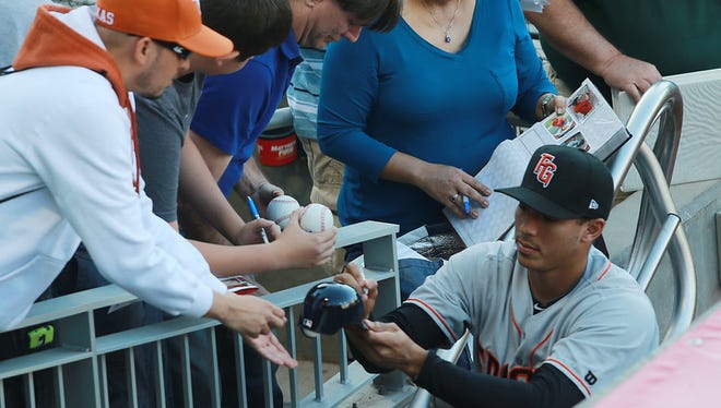 Carlos Correa signs autographs for El Paso fans in 2015 while playing for the Fresno Grizzlies. The American League All-Star shortstop returns to El Paso Monday on a rehab assignment for a torn ligament in his left thumb