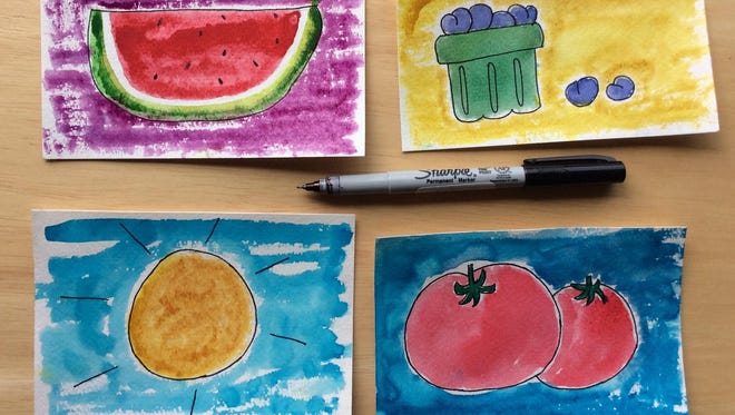 Outline your watercolor postcards with black ink to give it a finished look.