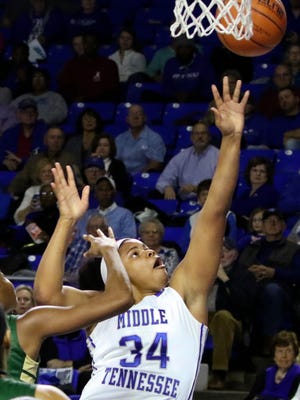 Olivia Jones (34) goes to the boards on Sunday. Jones played a major role scoring 17 points in the 68-40 win over UAB.