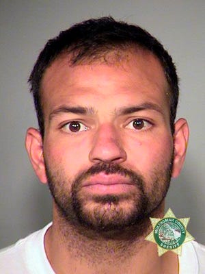 This undated photo provided by the Multnomah County Sheriff's office shows Sergio Martinez. A sheriff in Oregon and federal authorities are blaming each other for the case of Mexican immigrant Martinez, who has been deported from America at least 13 times and who allegedly assaulted two women within days of being released from jail.