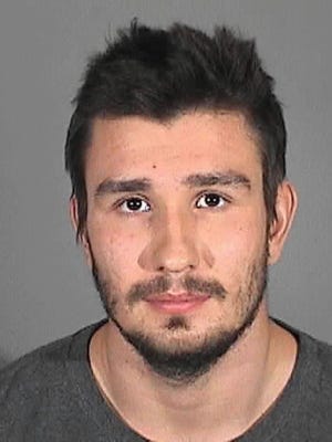 This Monday, Oct. 20, 2014 police booking photo provided by the Redondo Beach Police Department shows Los Angeles Kings' defenseman Slava Voynov. The NHL suspended Voynov indefinitely Monday, after the two-time Stanley Cup winner's arrest on suspicion of domestic violence.