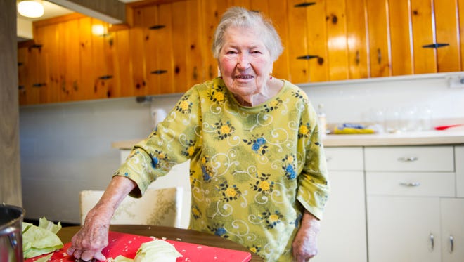 Maria Zazubec, 89, of West Irondequoit prepares her homemade sauerkraut.