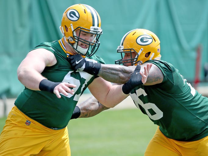 Green Bay Packers defensive end Mike Daniels (76) drills