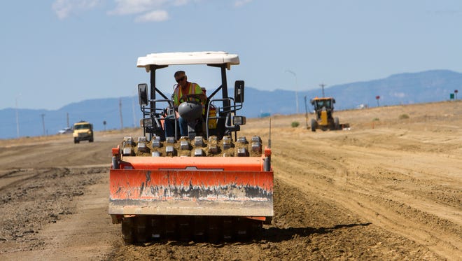 Work continues on a runway improvement project on Wednesday at the Shiprock Airstrip.