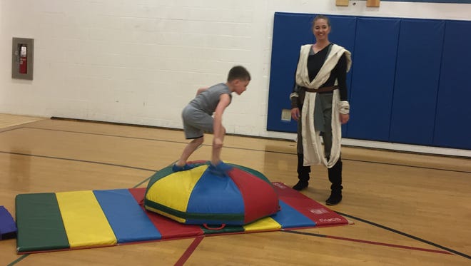 York JCC Youth Fitness Director Holly Metzger-Brown (right) dresses as Rey from "Star Wars" as she leads a Family Play Day on Friday, May 4. The event was part of Give Local York, a 24-hour giving spree to support more than 200 York County nonprofits.