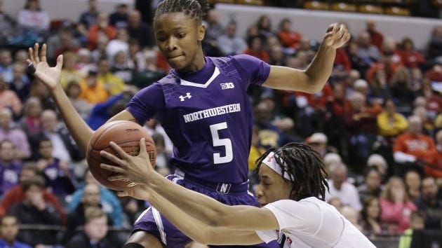 In this March 5, 2016, file photo, Maryland's Brene Moseley (3) and Northwestern's Jordan Hankins (5) go for a loose ball during an NCAA college basketball game at the Big Ten Conference tournament in Indianapolis. Hankins was found dead in her room at the university.