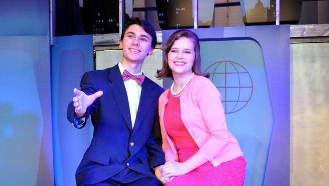 J. Pierrepont Finch (Jacob Higdon) woos secretary Rosemary Pilkington (Peyton Overstreet) as he makes his way up the corporate ladder in "How to Succeed in Business Without Really Trying"
