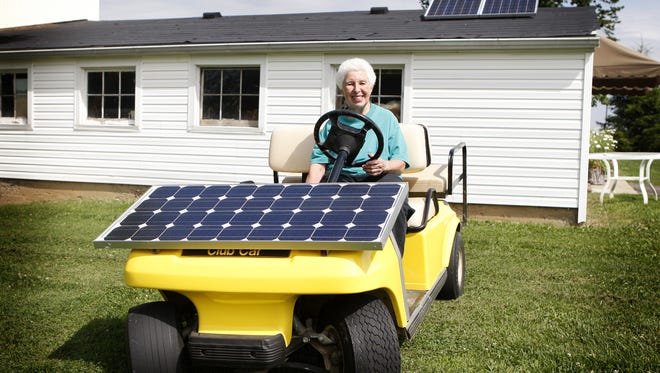 Sister Paula Gonzalez in 2010, taken for a feature story on her in The Enquirer. Here, she sits inside her solar powered golf cart called "Sunny." Gonzalez founded EarthConnection, described as "a center for learning and reflection about 'living lightly' on earth." Though she isn't actively involved with EarthConnection anymore, she does live in a passive solar house she designed and tools around Mount St. Joseph in suny. The Enquirer/Amanda Davidson