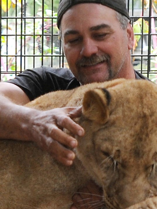 Friend of exotic-animal owner writes book about killings