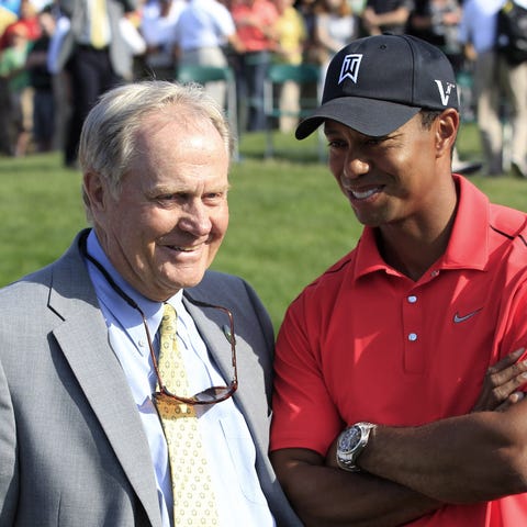 In 2012, Jack Nicklaus, left, talks with Tiger Woo