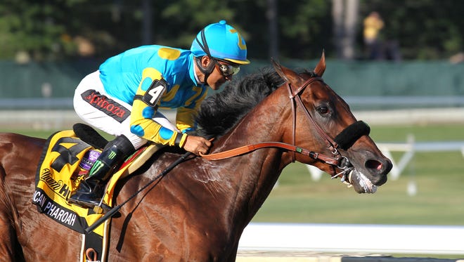 American Pharoah #4 with Victor Espinoza riding, won the $1,750,000 Grade 1 William Hill Haskell Invitational at Monmouth Park in Oceanport, New Jersey on Sunday, Aug. 2, 2015. (Ryan Denver/EQUI-PHOTO, via AP)