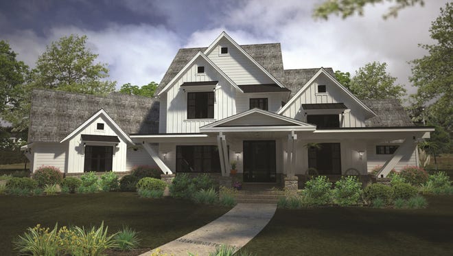 Crisp farmhouse styling includes moderns twists like vertical siding and dark windows.