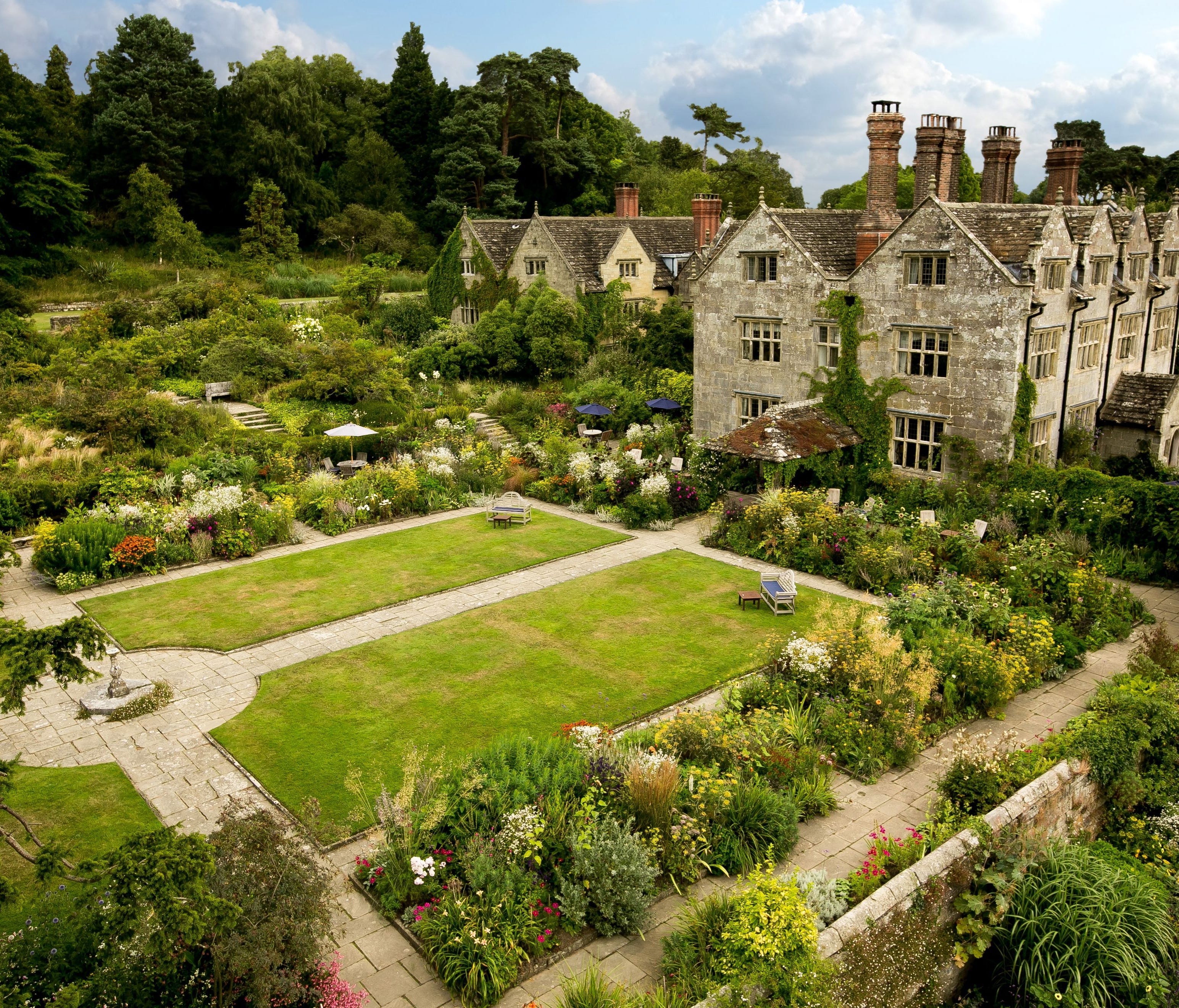 Gravetye Manor, East Grinstead, Sussex: An Elizabethan stone manor house built by an ironmaster for his bride, Gravetye was home from 1884 to William Robinson, exponent of the natural garden style. 