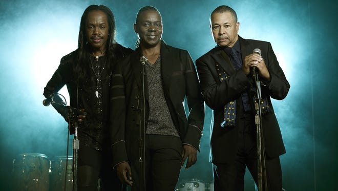 This undated publicity image released by Sony Legacy shows, from left, Verdine White, Philip Bailey and Ralph Johnson from the band Earth, Wind & Fire.  The group will release their first album in eight years called 
"??Now, Then & Forever"? on Sept. 10. (AP Photo/Sony Legacy)