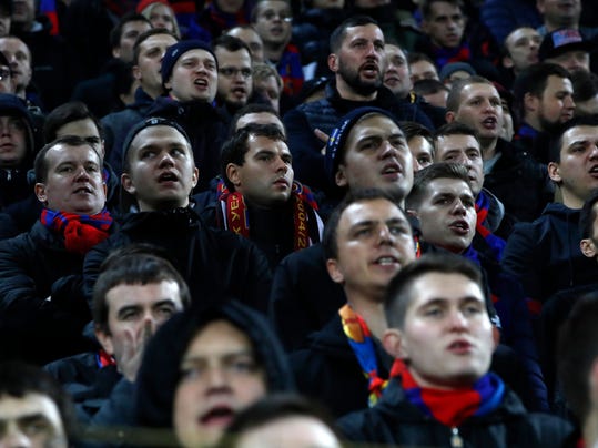 CSKA fans watch the Champions League Group A soccer match between CSKA Moscow and Basel in Moscow, Russia, Wednesday, Oct. 18, 2017. (AP Photo/Pavel Golovkin)