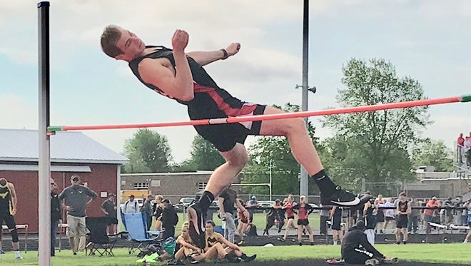 Mansfield Christian freshman Seth Stoner cleared 6-2 to win a Division III district high jump title.