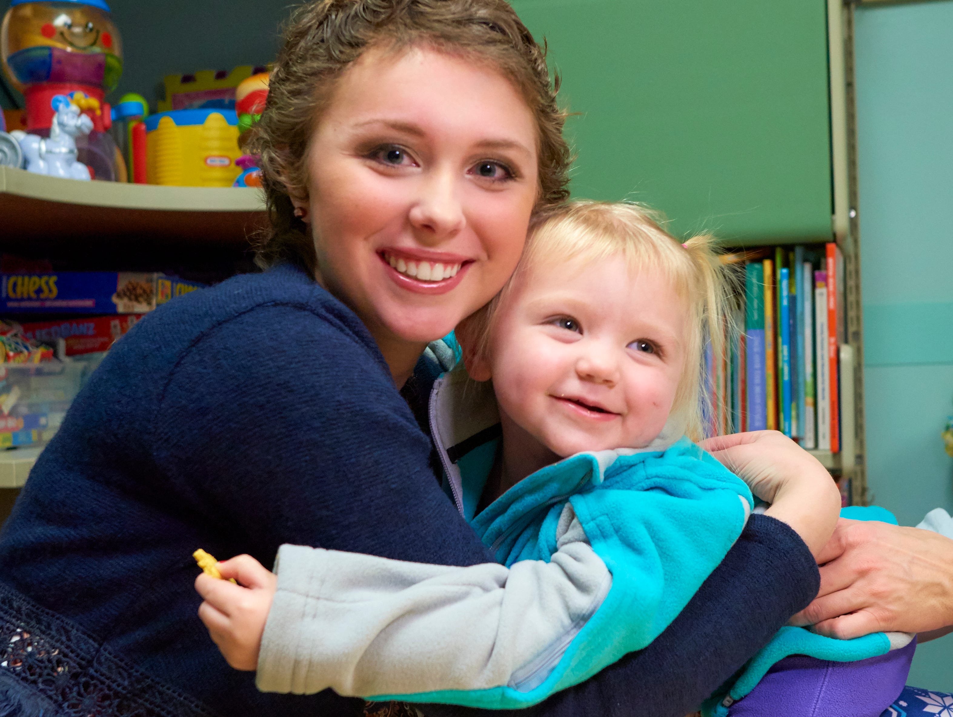Geisinger Health cancer patient Hunter Jones is shown  here with fellow patient Jayda Wright after she gave Jayda a special chemotherapy jacket.