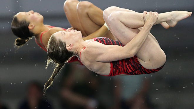 Jessica Parratto and Amy Cozad dive during the U.S. Olympic women's synchronized 10-meter platform finals at IUPUI, Indianapolis, Wednesday, June 22, 2016. 
