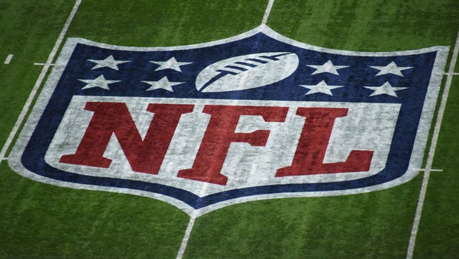The NFL logo at midfield is seen before Super Bowl LII between the New England Patriots and the Philadelphia Eagles at U.S. Bank Stadium.