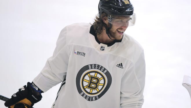 David Pastrnak, who had been absent for virtually all of the Bruins' two-week camp at Warrior Arena and was listed as "unfit to participate," is with the team in Toronto.