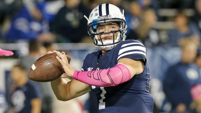 BYU quarterback Christian Stewart warms up before the game against Nevada on Saturday.