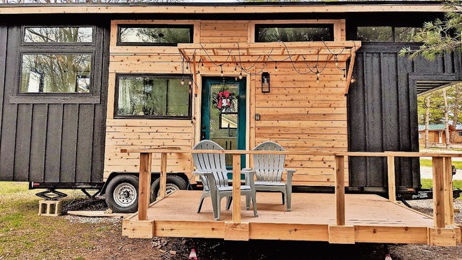 Enjoy serene lake views and all the comforts of home at the Hocking Hills Tiny Houses.