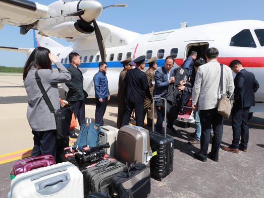 South Korean journalists arrive at North Korea's Kalma