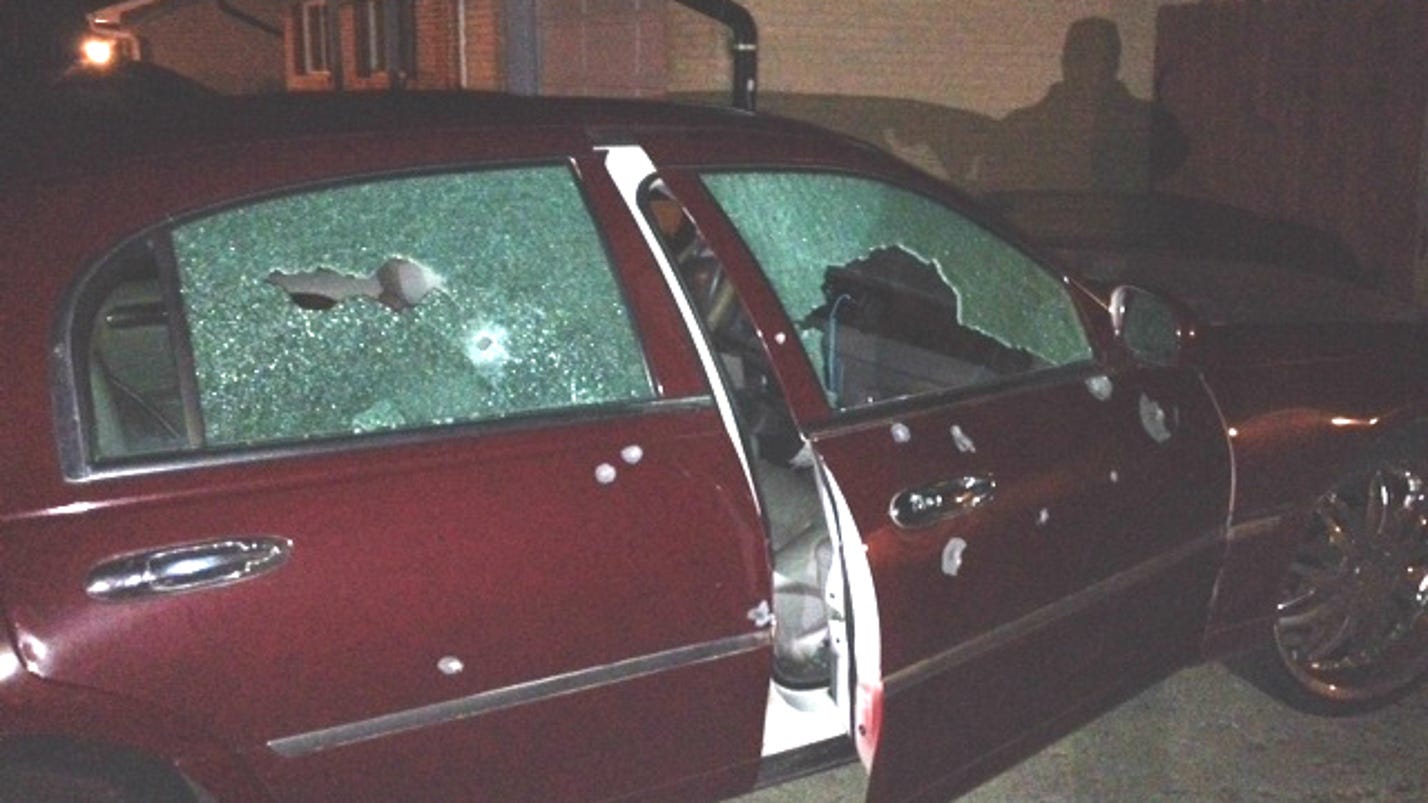 2 wounded as bullets pumped into car