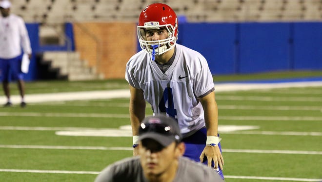 Louisiana Tech linebacker Michael Mims is serving as the scout team quarterback to prepare for Navy's triple option.
