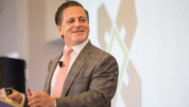 Dan Gilbert, Quicken Loans chairman and one of the three task force members, details the Blight Removal Task Force report on Tuesday, May 27,  2014.