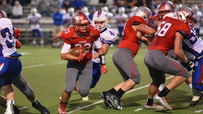 SJCC's Ross Snyder carries the football Saturday.