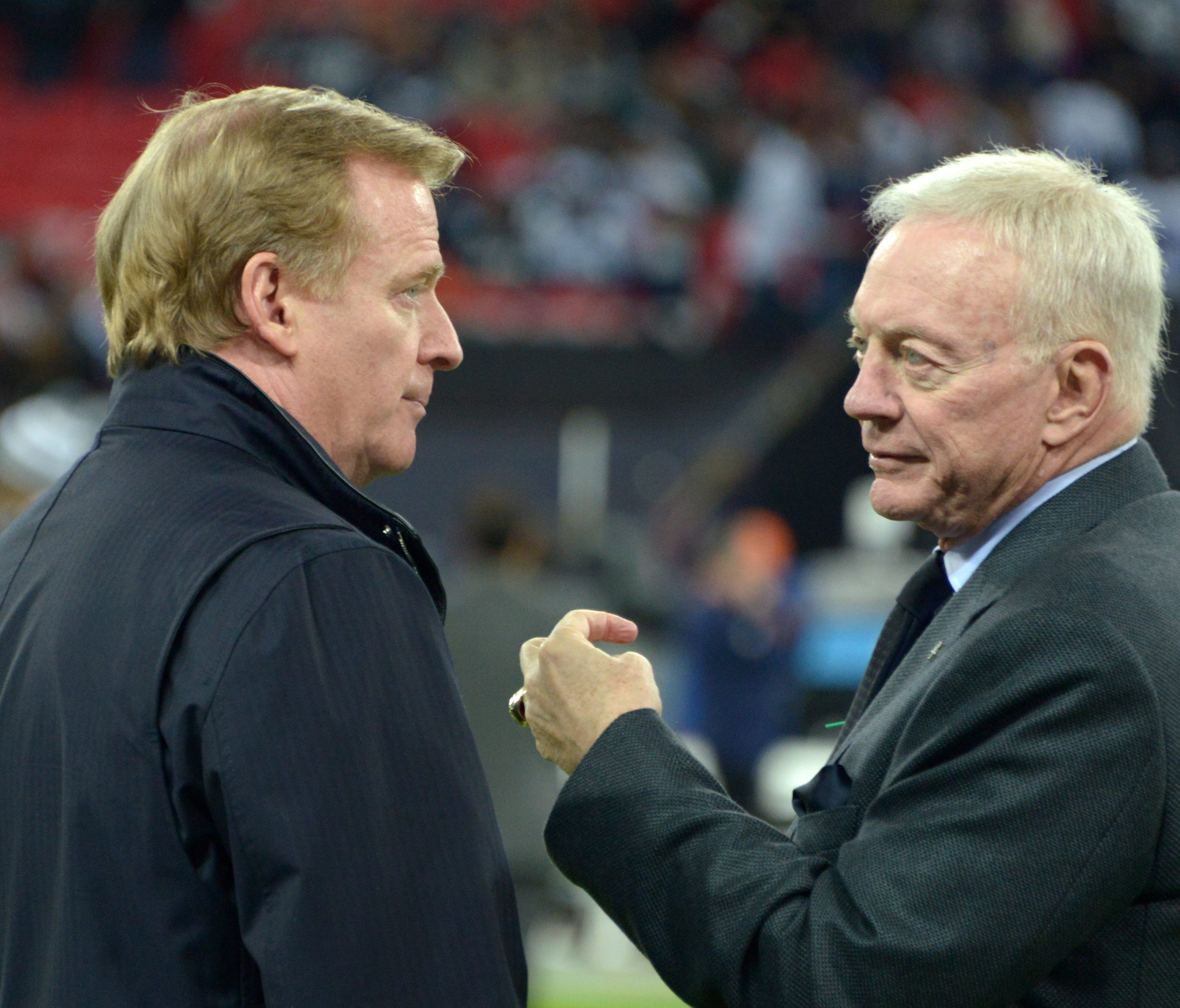 Dallas Cowboys owner Jerry Jones (right) is threatening to sue the league over NFL commissioner Roger Goodell's contract negotiations.